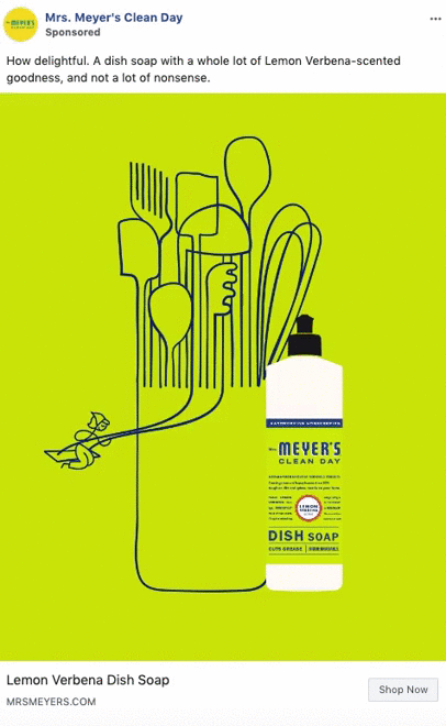 A bottle of Mrs. Meyer’s Clean Day Lemon Verbena Dish Soap is shown next to an illustration of kitchen utensils in a cup on a bright yellow background.