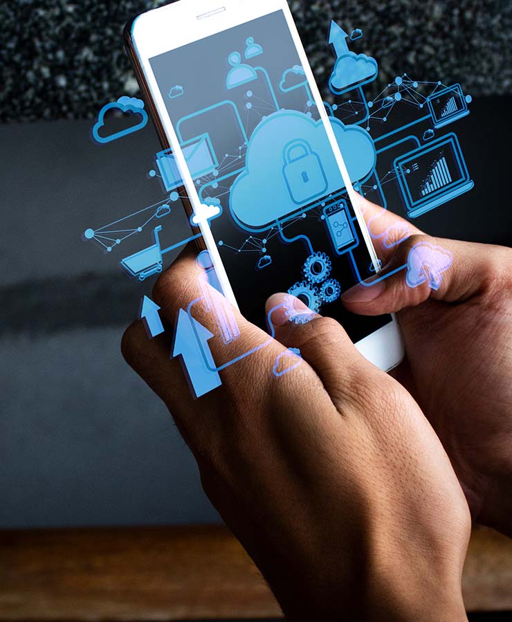 Hands holding a smartphone with digital cloud and security icons illustrated above the device, representing mobile cloud computing and data security.